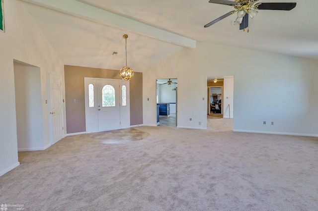 foyer entrance featuring baseboards, lofted ceiling with beams, and ceiling fan