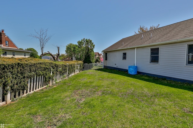 view of yard featuring a fenced backyard