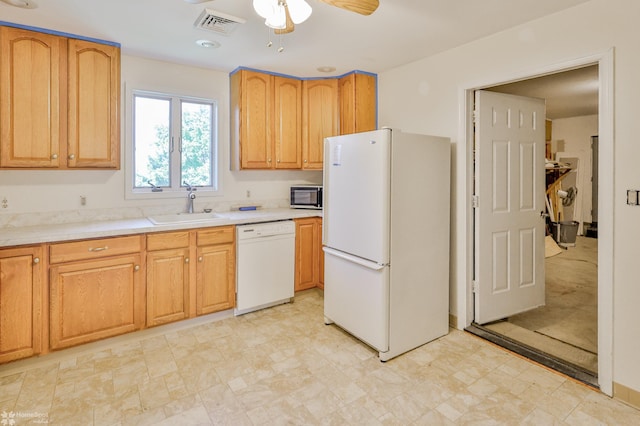 kitchen with a ceiling fan, white appliances, light floors, light countertops, and a sink