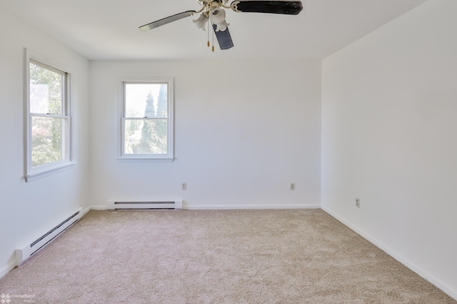 carpeted empty room featuring baseboards, ceiling fan, and baseboard heating