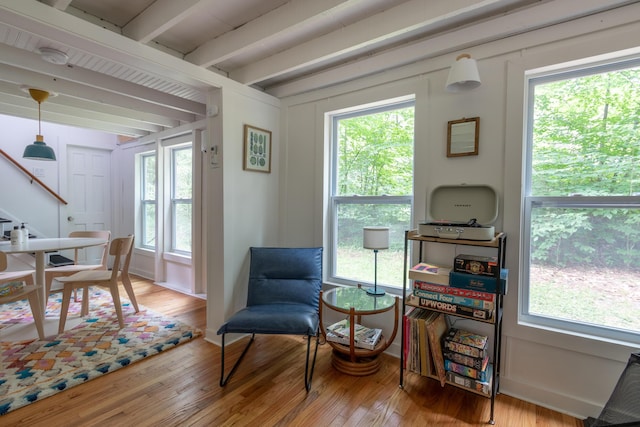 235 3rd St, Pocono Pines, PA 18350 - living area with beamed ceiling and wood finished floors