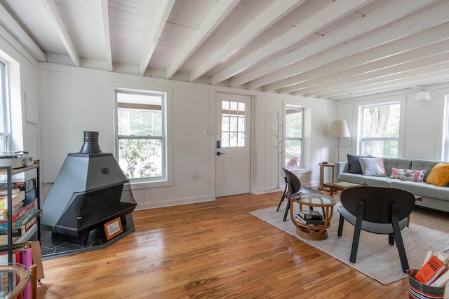235 3rd St, Pocono Pines, PA 18350 - living area with light wood-style flooring, beam ceiling, and baseboards
