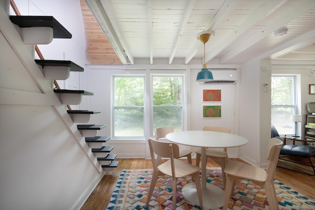 235 3rd St, Pocono Pines, PA 18350 - dining room with light wood finished floors, wooden ceiling with exposed beams, and baseboards