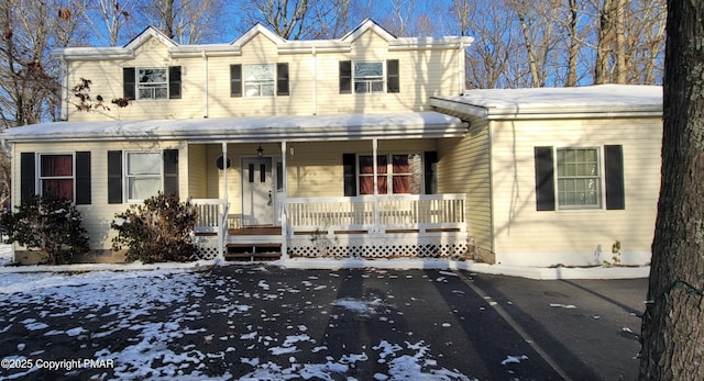 view of front of property featuring covered porch