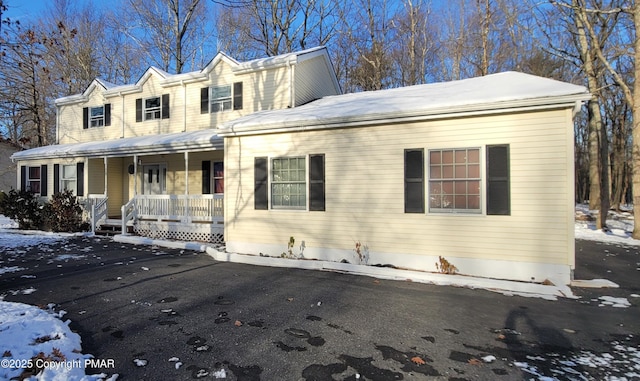 view of front of home featuring covered porch