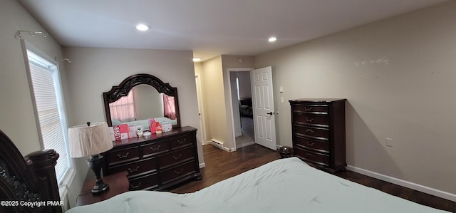 bedroom featuring recessed lighting, a baseboard radiator, baseboards, and dark wood-style floors