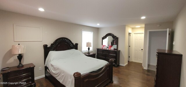 bedroom with recessed lighting, baseboards, and dark wood-style floors