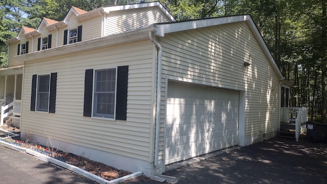 111 Brewster Way E, Stroudsburg, PA 18301 - view of home's exterior featuring a garage