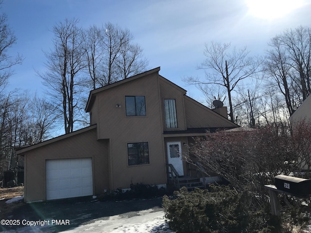 view of front of home with a garage