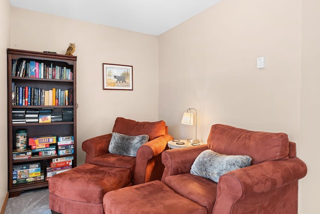 sitting room featuring carpet floors