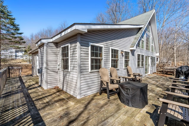 exterior space featuring a wooden deck