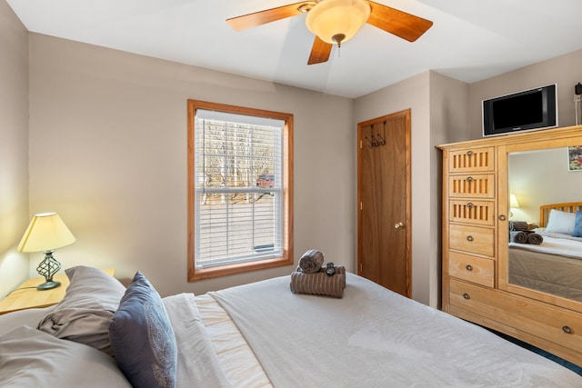 bedroom featuring ceiling fan