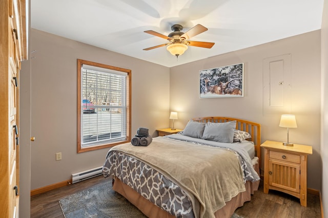 bedroom with baseboard heating, ceiling fan, baseboards, and dark wood-style flooring