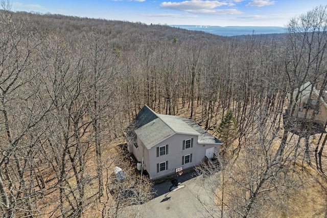 aerial view featuring a view of trees