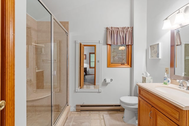 bathroom featuring toilet, vanity, a stall shower, a baseboard radiator, and baseboards