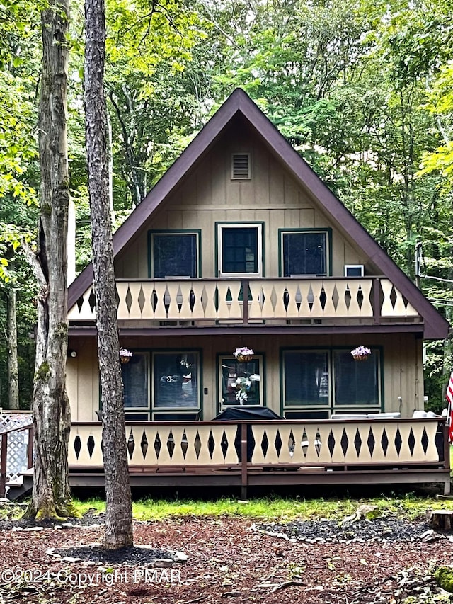 chalet / cabin with board and batten siding