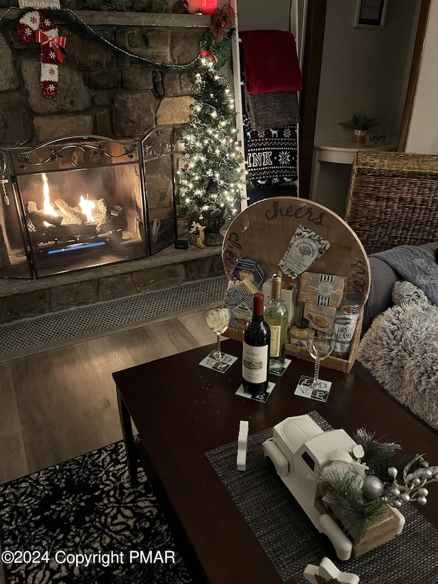 interior space featuring a fireplace and wood finished floors