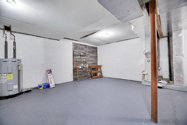 3122 Sparrow Ct, East Stroudsburg, PA 18302 - unfinished below grade area featuring water heater and concrete block wall