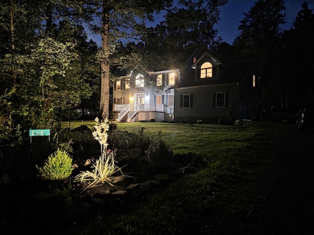 210 Grouse Run, Cresco, PA 18326 - back of property with a lawn and stairs