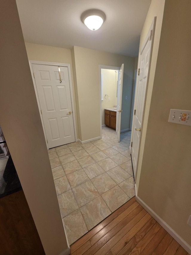 210 Grouse Run, Cresco, PA 18326 - hallway with baseboards and light wood-type flooring