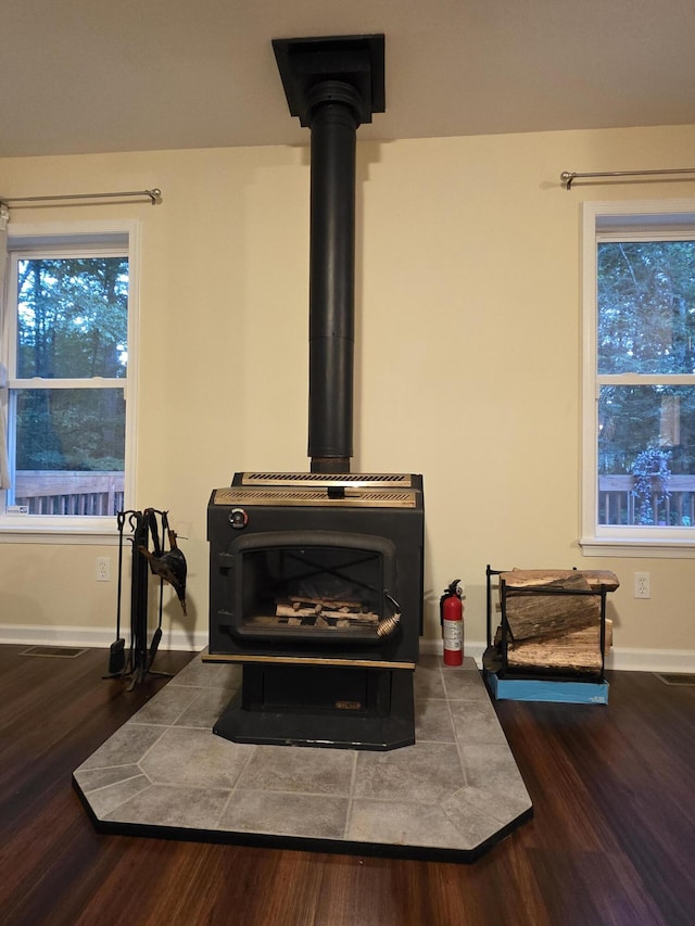 210 Grouse Run, Cresco, PA 18326 - detailed view of a wood stove and wood finished floors