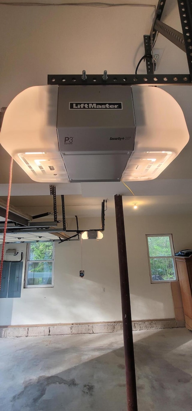210 Grouse Run, Cresco, PA 18326 - garage view of unfinished concrete floors and electric panel