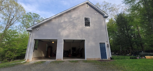210 Grouse Run, Cresco, PA 18326 - view of home's exterior with gravel driveway and a garage