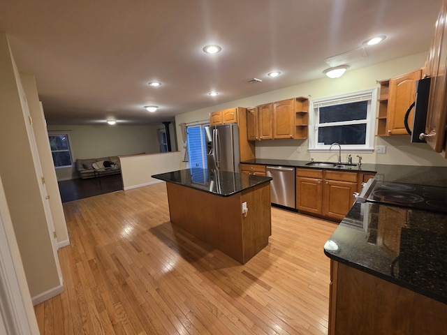 210 Grouse Run, Cresco, PA 18326 - kitchen with open shelves, stainless steel appliances, a kitchen island, open floor plan, and light wood-style floors