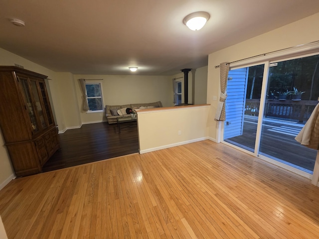210 Grouse Run, Cresco, PA 18326 - unfurnished living room with light wood finished floors and baseboards