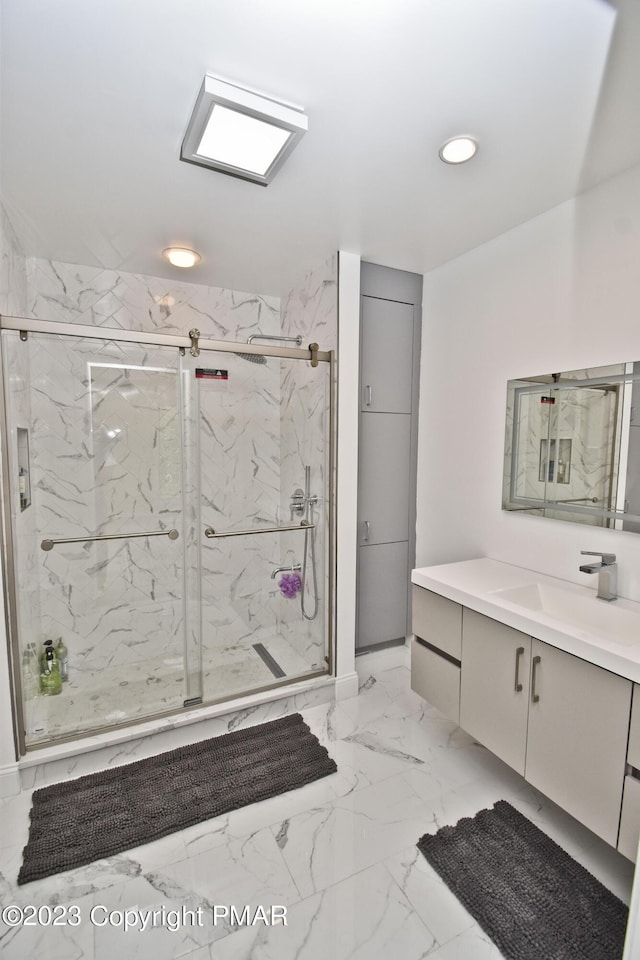 386 Camelback Rd, Tannersville, PA 18372 - full bathroom featuring recessed lighting, vanity, marble finish floor, and a marble finish shower