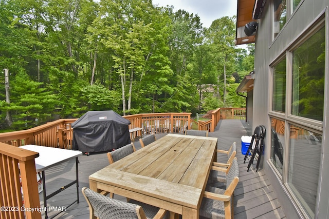 386 Camelback Rd, Tannersville, PA 18372 - wooden deck featuring outdoor dining area and a grill