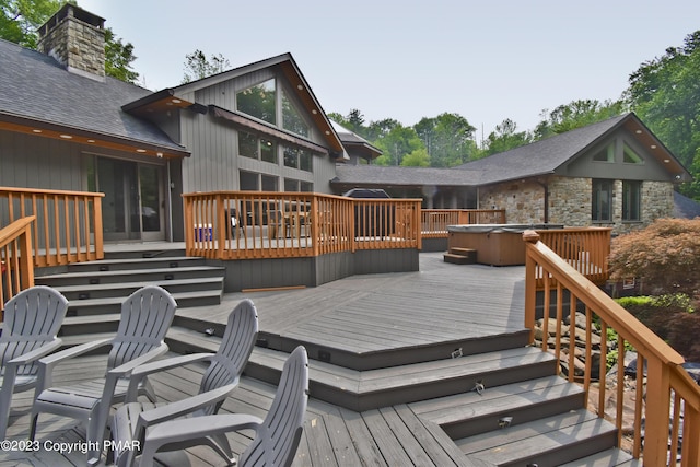 386 Camelback Rd, Tannersville, PA 18372 - wooden deck with a covered hot tub