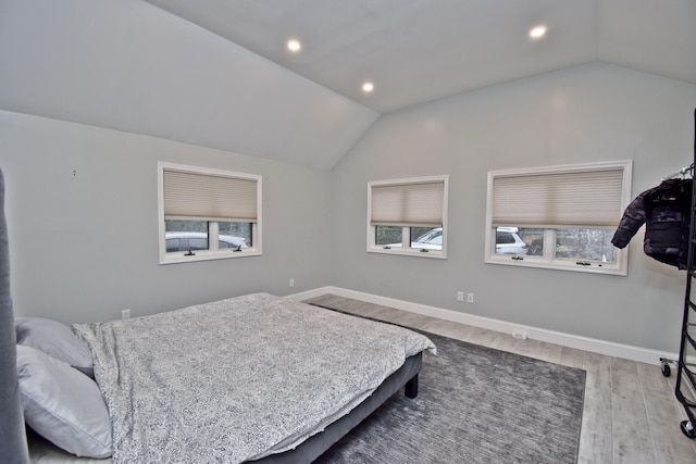 386 Camelback Rd, Tannersville, PA 18372 - bedroom with wood finished floors, baseboards, vaulted ceiling, and recessed lighting