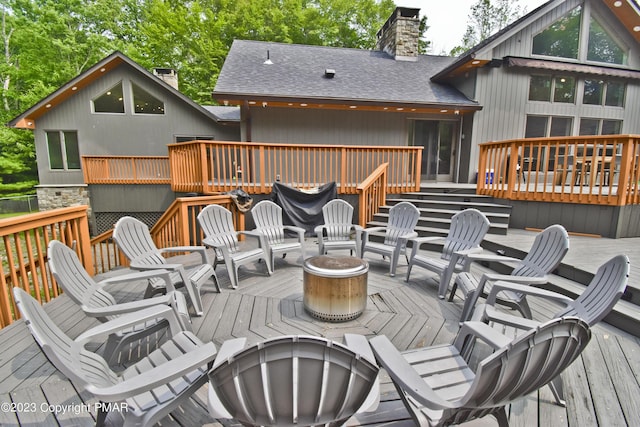 386 Camelback Rd, Tannersville, PA 18372 - wooden terrace featuring a fire pit