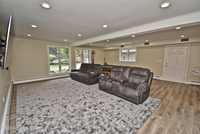 386 Camelback Rd, Tannersville, PA 18372 - living room with a baseboard radiator, recessed lighting, plenty of natural light, and wood finished floors