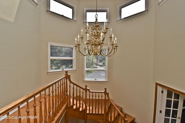 386 Camelback Rd, Tannersville, PA 18372 - stairway with a chandelier, a high ceiling, and plenty of natural light