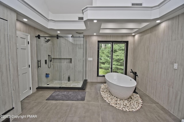 386 Camelback Rd, Tannersville, PA 18372 - bathroom featuring a freestanding tub, visible vents, and a stall shower
