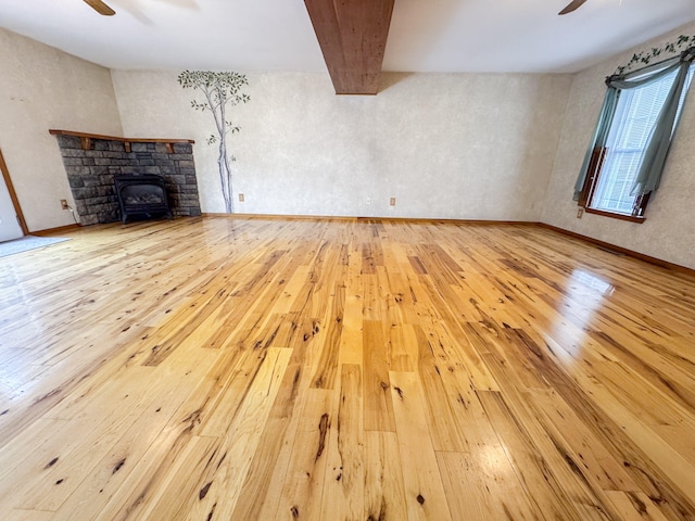 3708 Bayberry Dr, Danielsville, PA 18038 - unfurnished living room featuring ceiling fan, wood-type flooring, and beamed ceiling