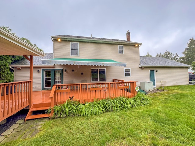 3708 Bayberry Dr, Danielsville, PA 18038 - back of house featuring a chimney, a lawn, and a wooden deck