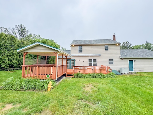 3708 Bayberry Dr, Danielsville, PA 18038 - back of house featuring a deck, a chimney, and a lawn
