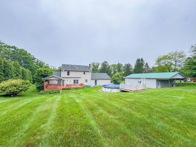 3708 Bayberry Dr, Danielsville, PA 18038 - view of green lawn featuring a wooden deck and a covered pool