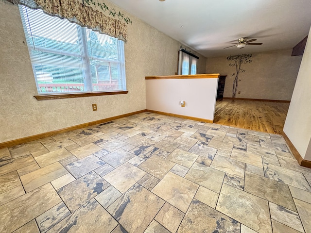 3708 Bayberry Dr, Danielsville, PA 18038 - empty room featuring ceiling fan and a textured wall