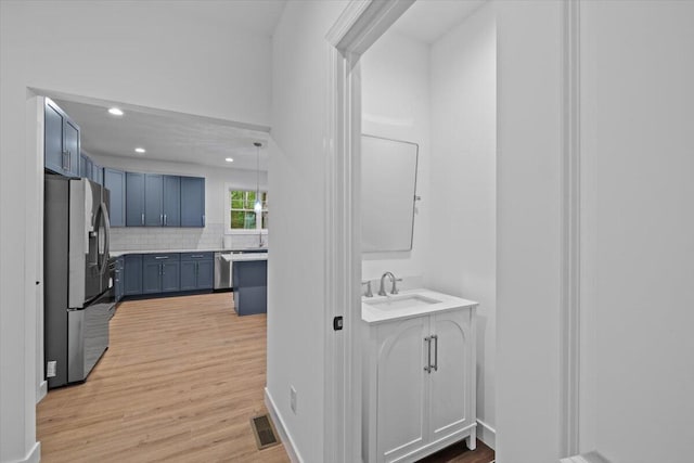 156 Crabapple Ln, Kunkletown, PA 18058 - bathroom with recessed lighting, wood finished floors, tasteful backsplash, and vanity