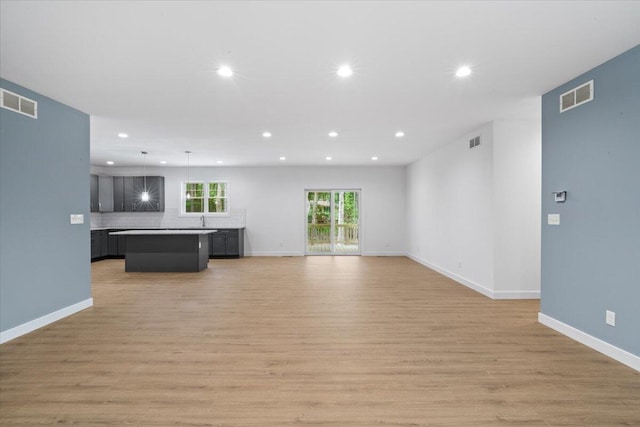 156 Crabapple Ln, Kunkletown, PA 18058 - unfurnished living room featuring recessed lighting and light wood-style flooring