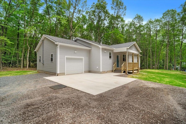 156 Crabapple Ln, Kunkletown, PA 18058 - single story home featuring concrete driveway, a garage, a porch, and a shingled roof