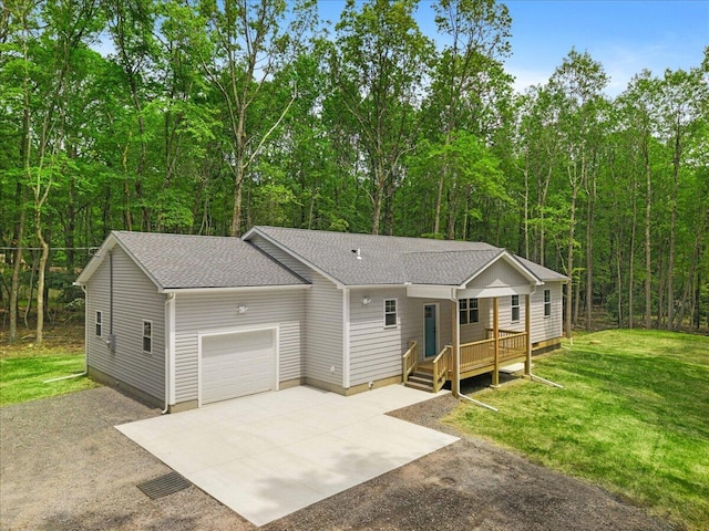 156 Crabapple Ln, Kunkletown, PA 18058 - view of front of property featuring asphalt driveway, a shingled roof, an attached garage, a front lawn, and a deck
