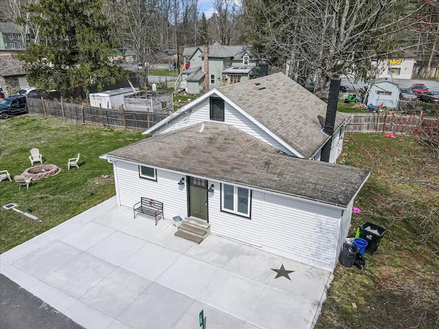 109 Silver Ln, Cresco, PA 18326 - back of property featuring entry steps, roof with shingles, a patio, and an outdoor fire pit