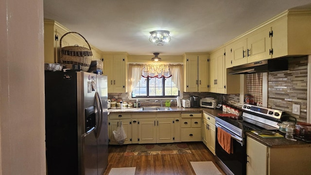 455 Laurel Pine Rd, Cresco, PA 18326 - kitchen with appliances with stainless steel finishes, under cabinet range hood, a sink, dark wood-type flooring, and cream cabinets