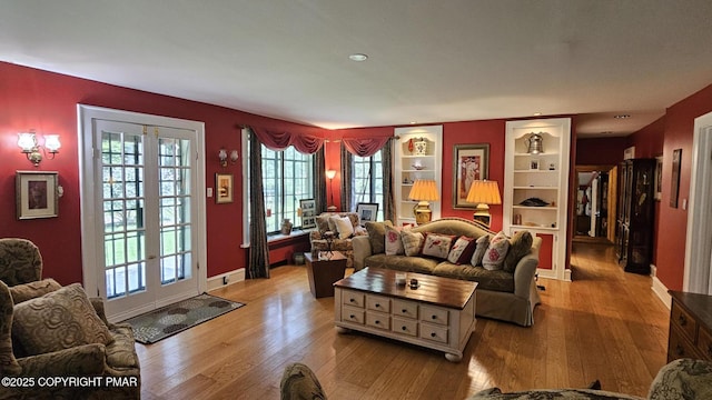 455 Laurel Pine Rd, Cresco, PA 18326 - living room with hardwood / wood-style flooring and built in shelves