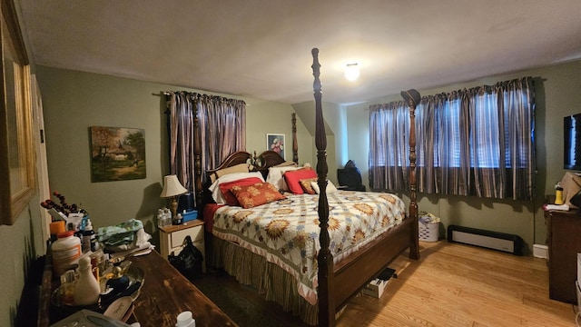 455 Laurel Pine Rd, Cresco, PA 18326 - bedroom featuring baseboard heating and wood finished floors